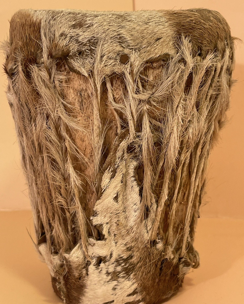 A small vintage hand drum