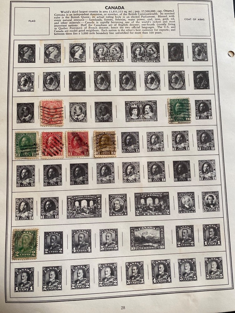 Worldwide Canada Stamps hinged on pages