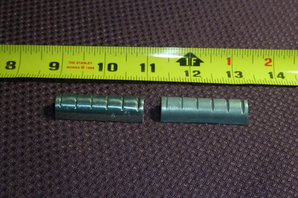 2 Older Used Vintage Guitar Riser Nuts - Item UB