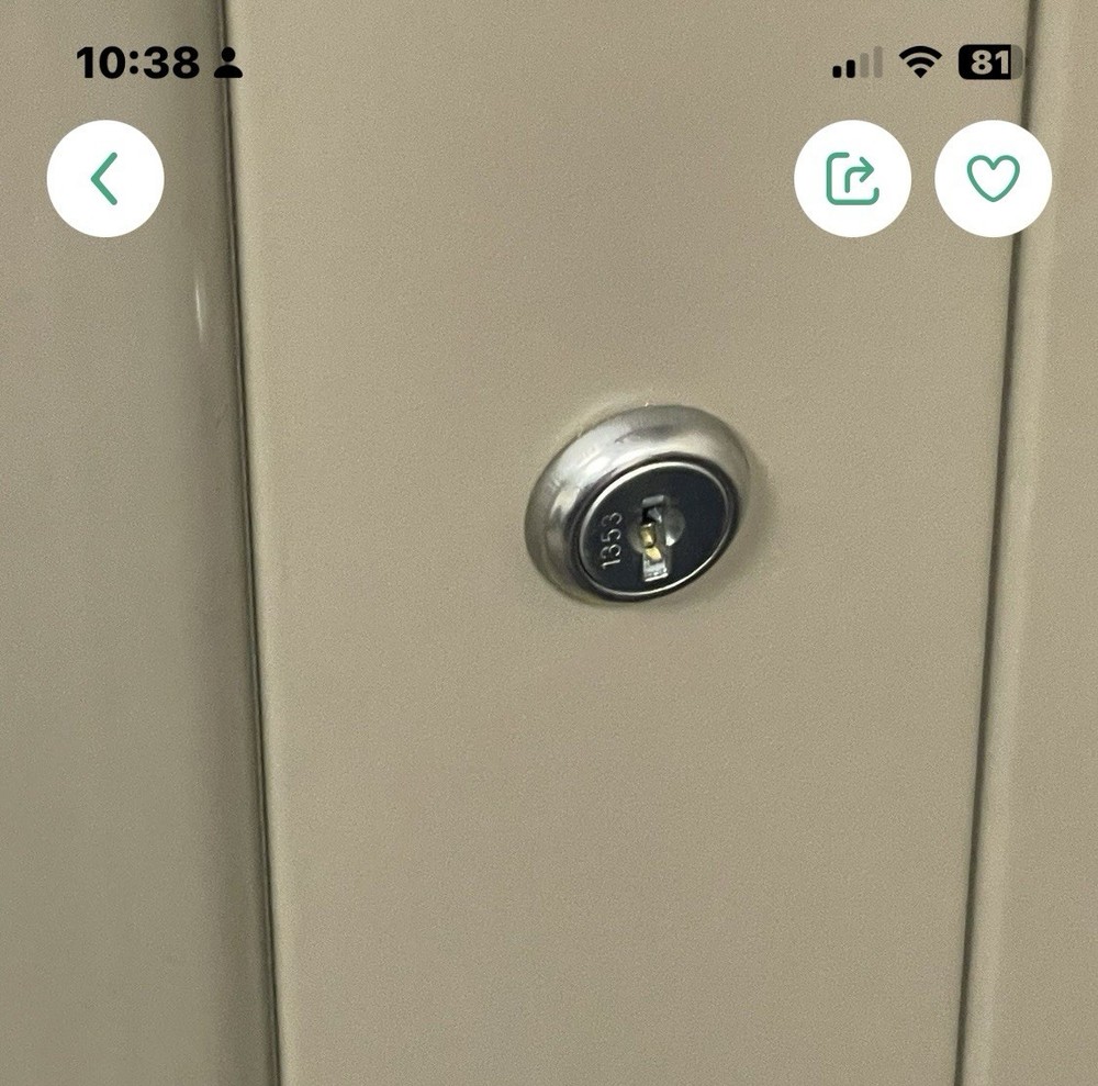File Cabinet , Lock with Key. Has Eight Shelves Rotate 2 sided.