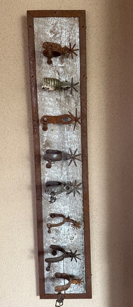 vintage western cowboy spurs display