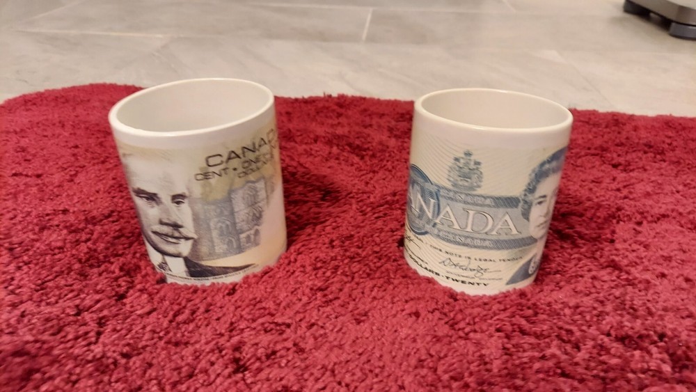 Two Rare Canadian Dollar Mugs