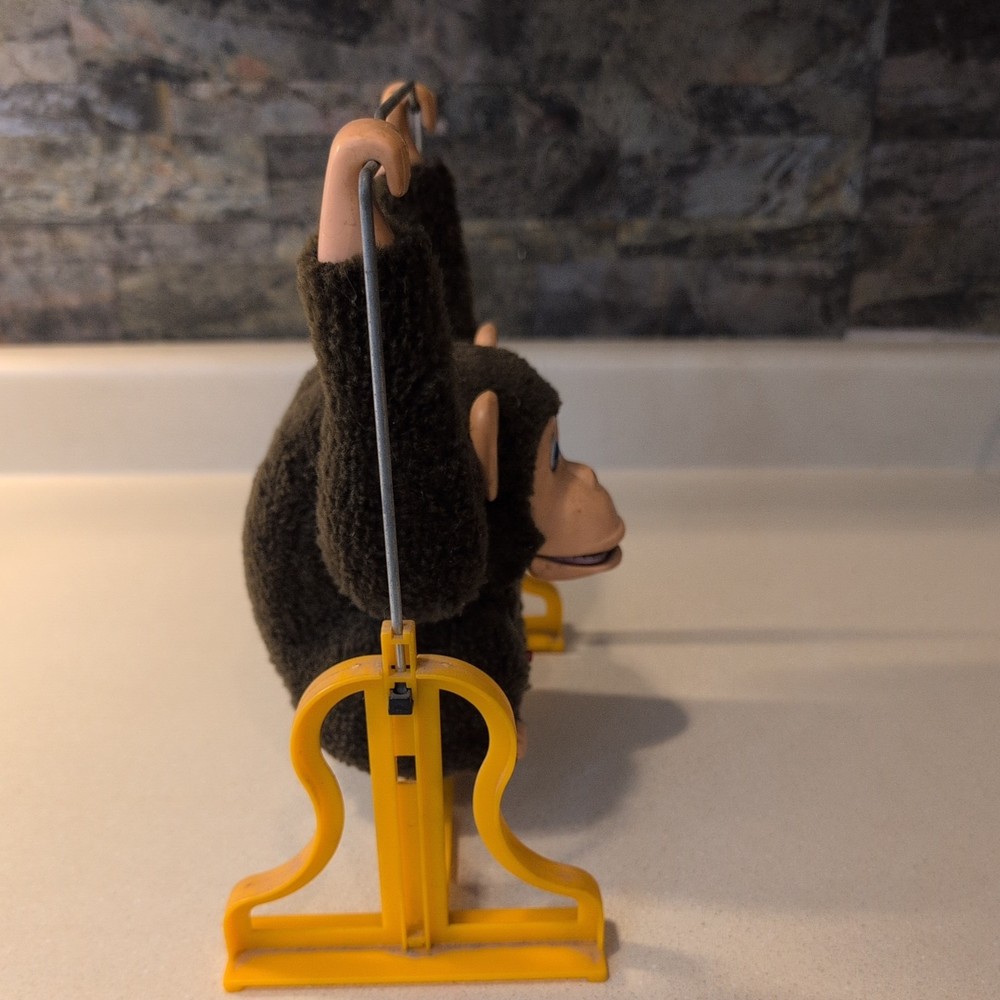 Antique Collectable Swinging Monkey ( Battery compartment needs cleaning)