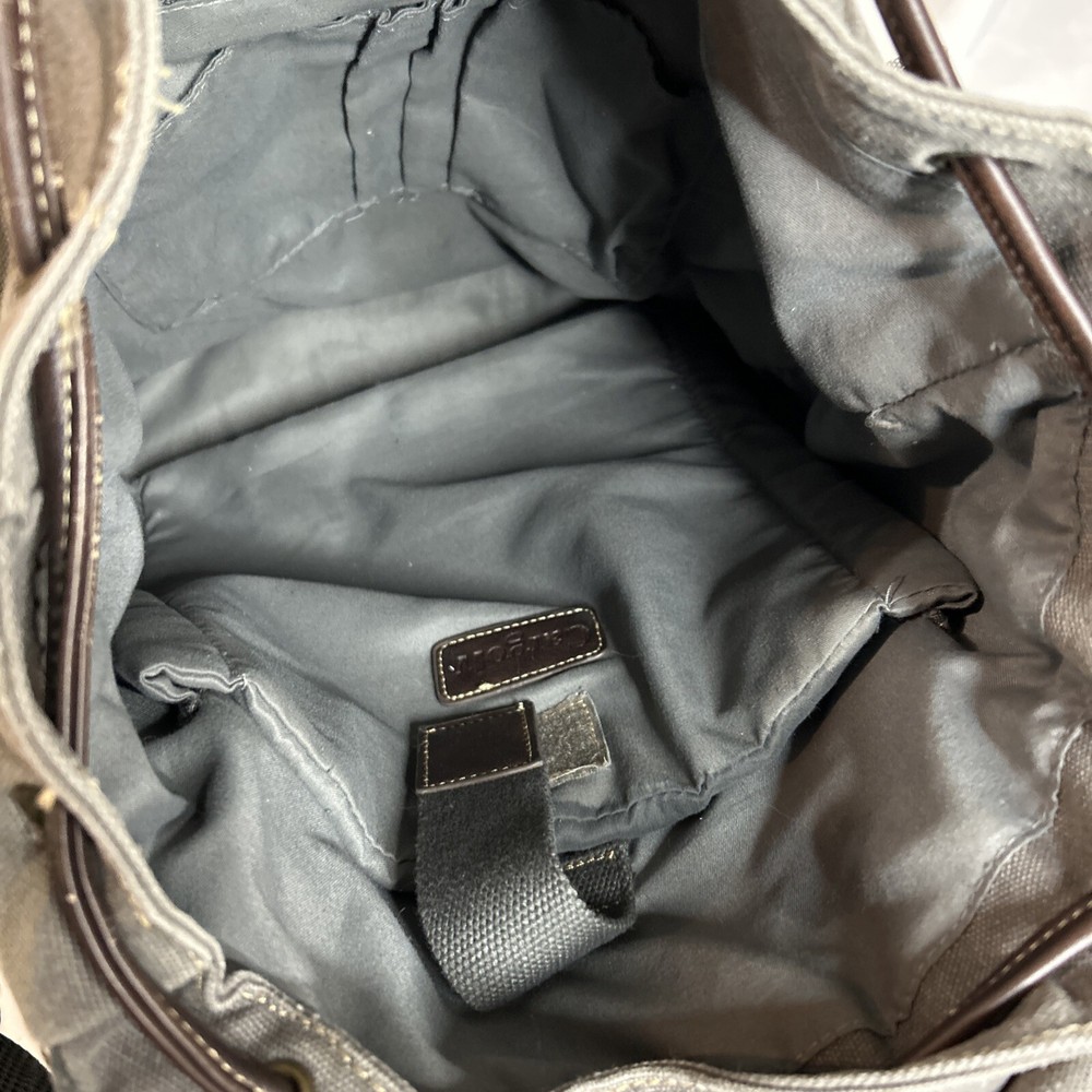 Cargoit Gray Canvas Backpack Magnetic Closures Pockets Straps and A Deep Inside