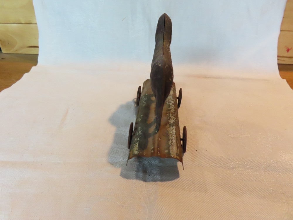 Antique tin dog pull toy