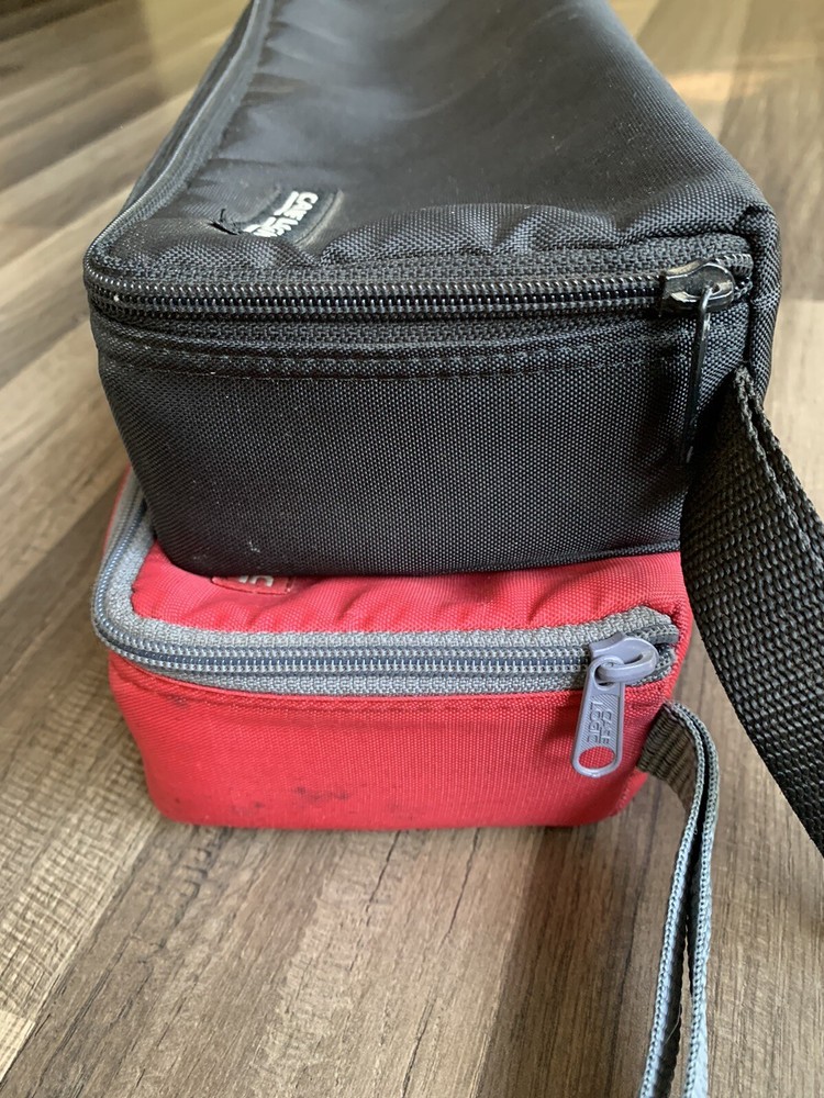 2- Case Logic 15-Cassette Cases (one Red, One Black)
