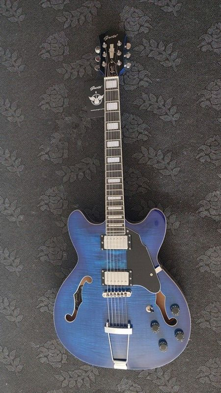 6 string jazz guitar transparent blue bock inlay set neck hh pickups