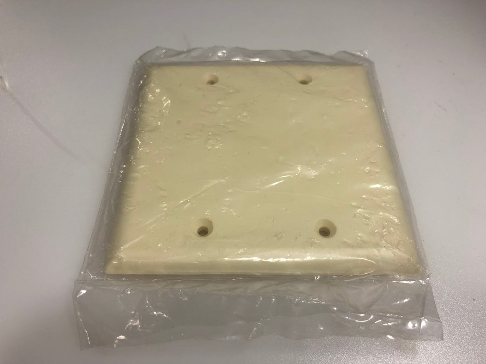 Cooper Ivory Blank Plastic Wall Plate (5137LA)