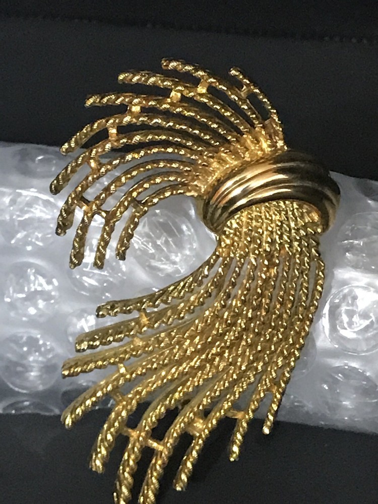 m jent brooch Sign