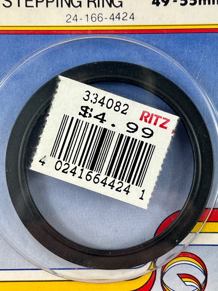 NEW - Quantaray Stepping Ring 49-55MM LC44