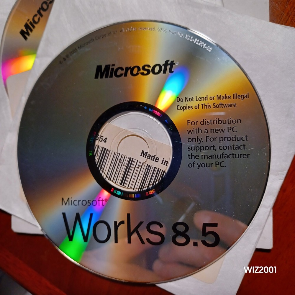 Genuine Microsoft Works 8.5 With Tracking ID & Office 2003 Trial Read Descriptio