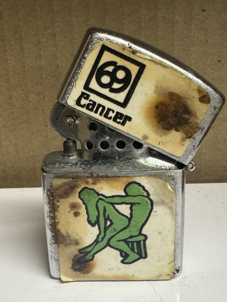 Cancer "penguin" Lighters Needs Work never Used Lid Does Not Close