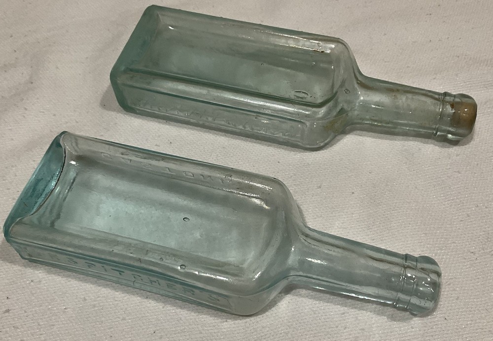 4 Various Green or Aqua Blue Tinted Embossed Bottles Old