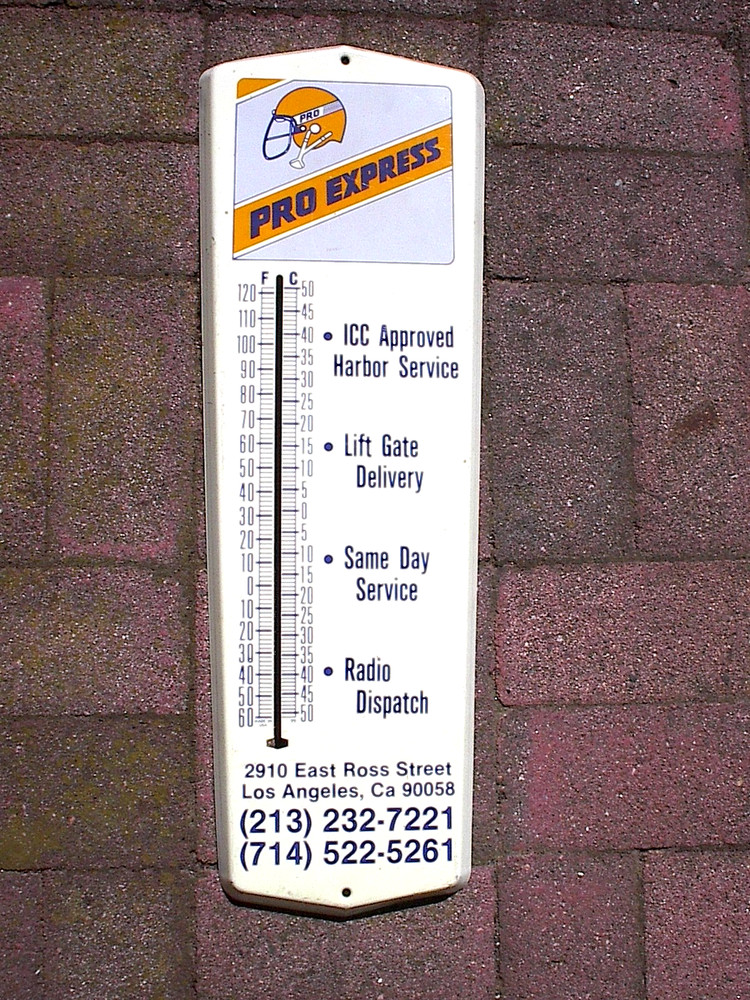 VVINTAGE  PRO EXPRESS TRICKING CO. THERMOMETER, 24" LONG