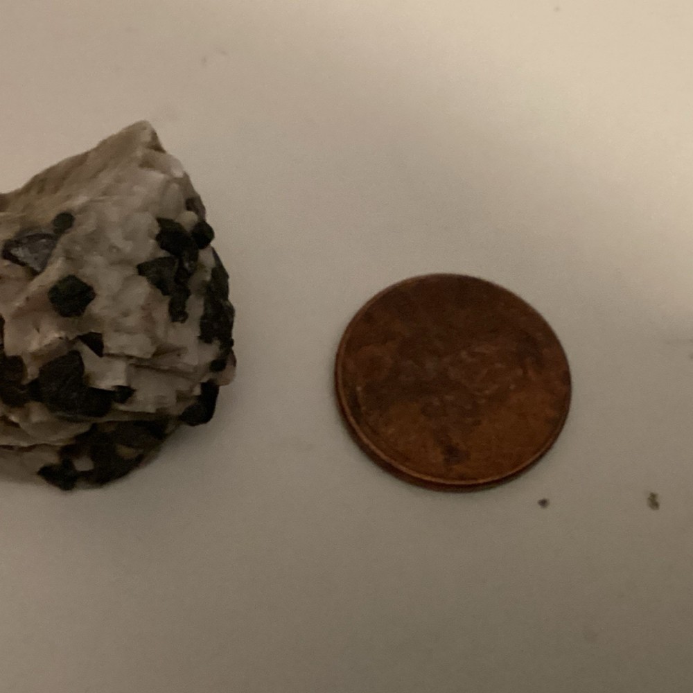 Fluorescent Mineral Specimen with Black Inclusions Small Size. L4