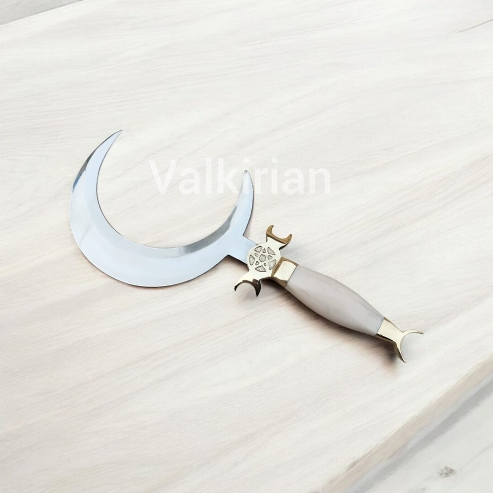 Handcrafted Crescent Moon Dagger with a curved blade and camel bone horn handle.
