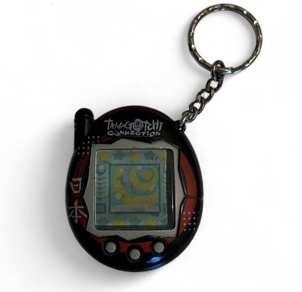 2004 Tamagotchi Connection Keychain. Good Used Working Condition,See Description