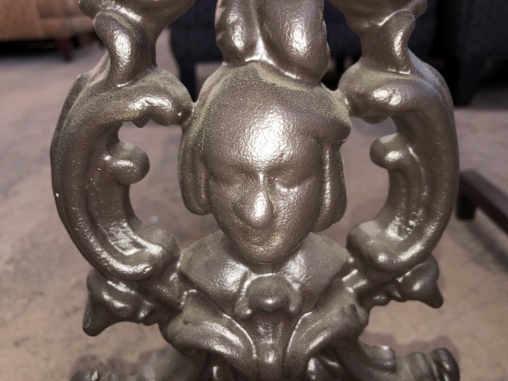 Andirons With Faces