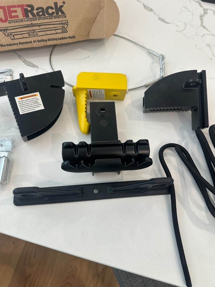 Van Interior Ladder Storage System Utilizes Overhead and System+Mounting Kit