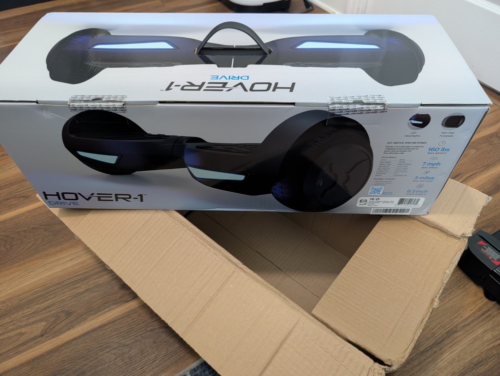 Hover-1 Drive Electric Hoverboard, 7MPH, 3 Mile Range, LED Lights, Black