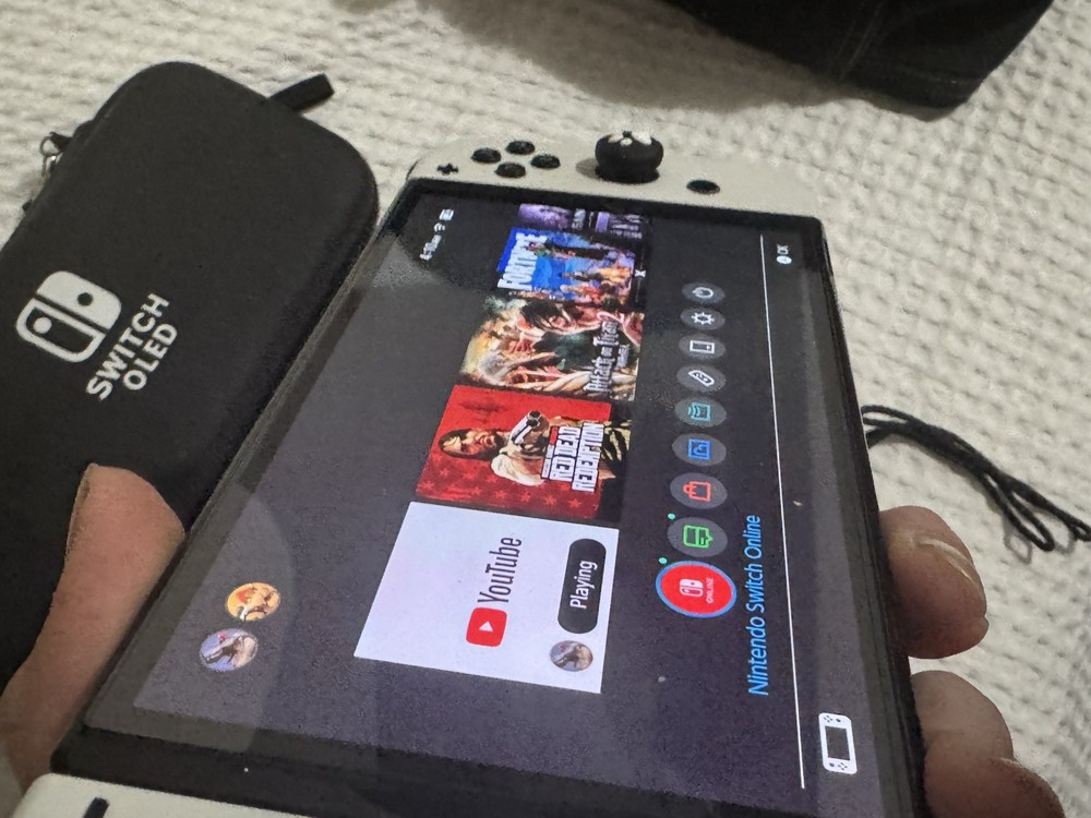 Nintendo Switch OLED Bundle with Red Dead Redemption, Carrying Case, Joy-Cons