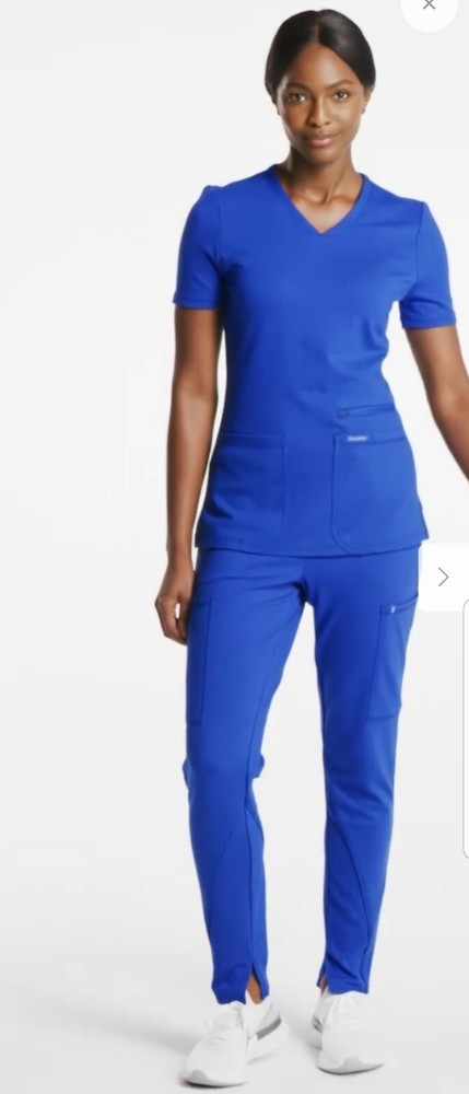 2 tops/ 1 bottom scrubs new size small
