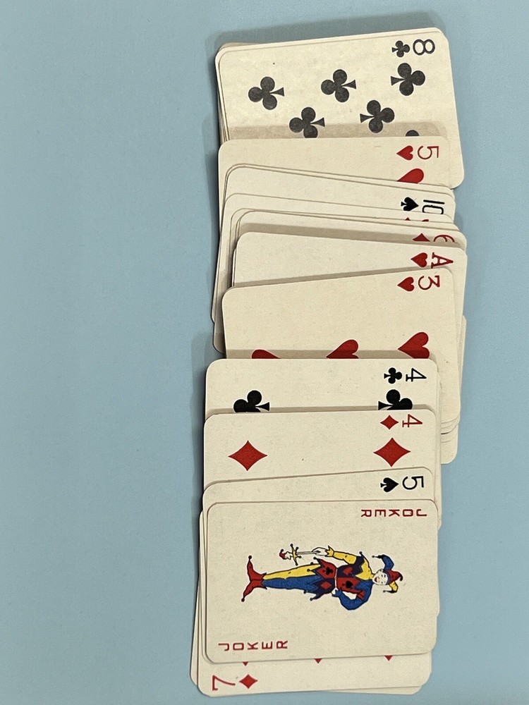 TWIN PACK PLAYING CARDS + CASE + SCORE PAD.