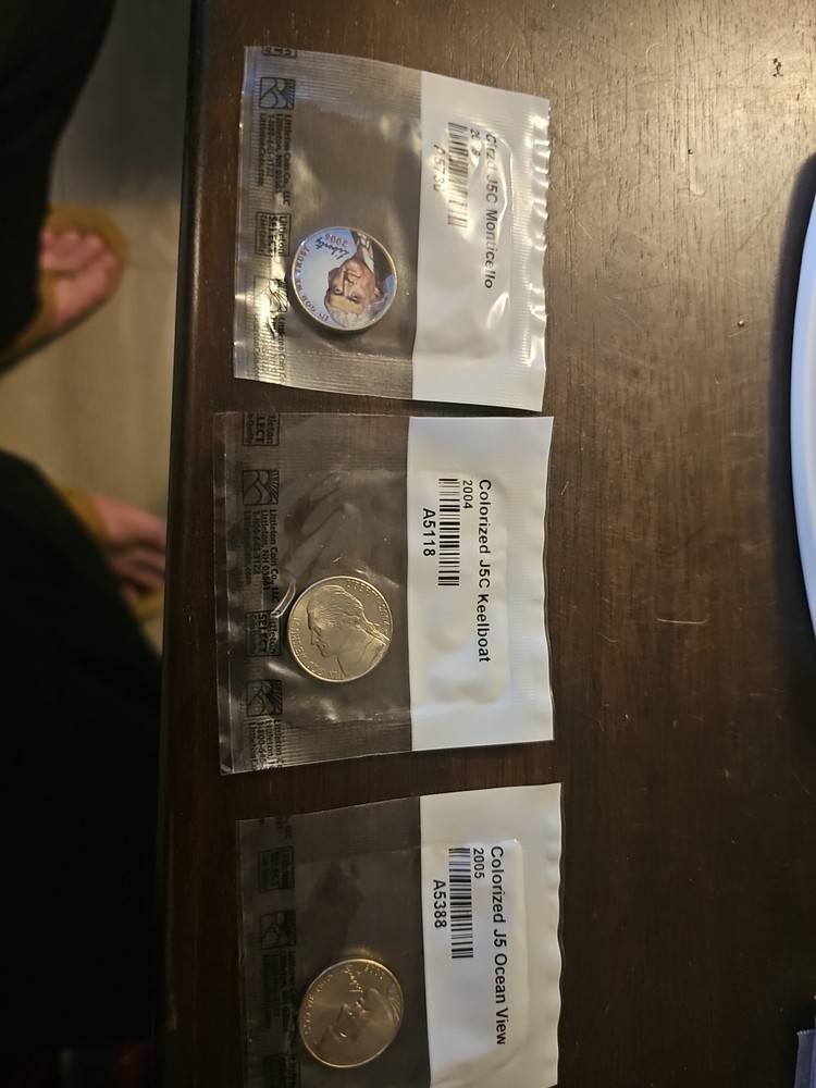 Three Colorized Coins
