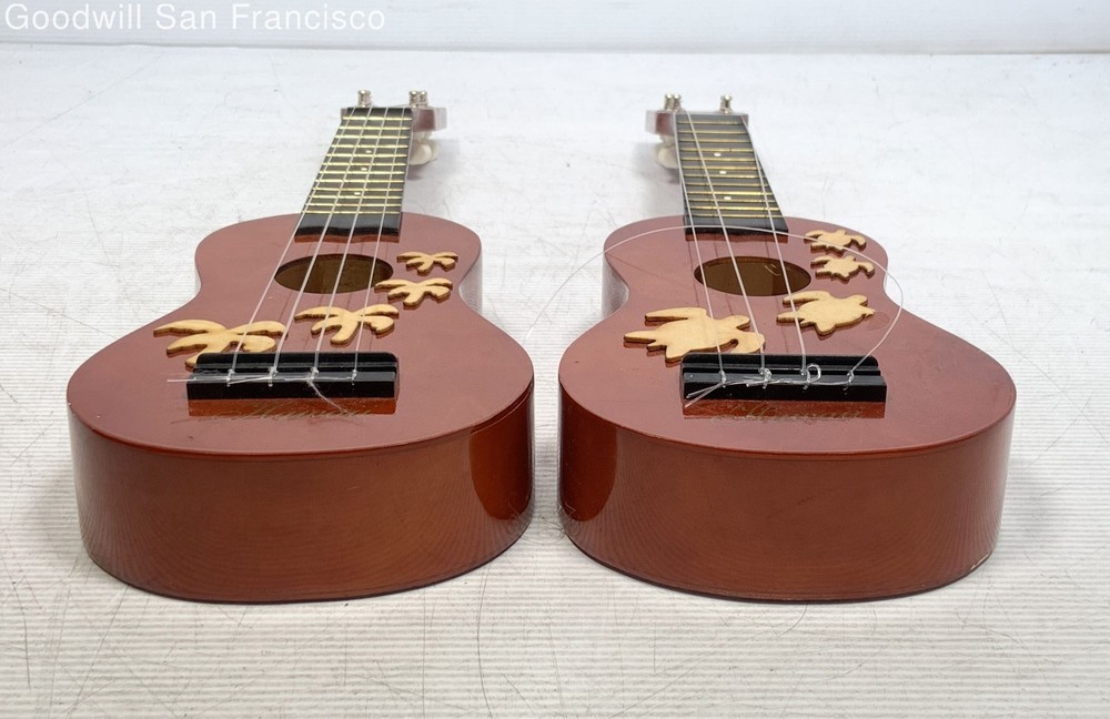 2 Universal Worldwide Trading Inc 4-String Soprano Ukuleles