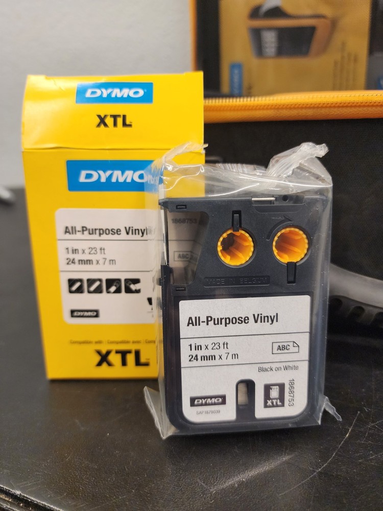 Dymo XTL 500 Label Maker bundle W/Case, Charger Owners Manual.