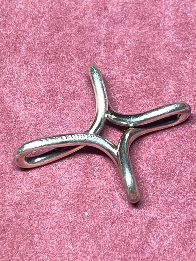 Cross-shaped necklace component, Tiffany & Co. Infinity Cross