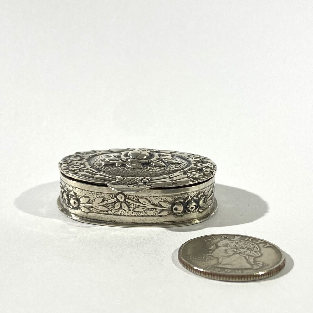 Antique Solid Silver Pillbox , Hallmarked with Floral decorations