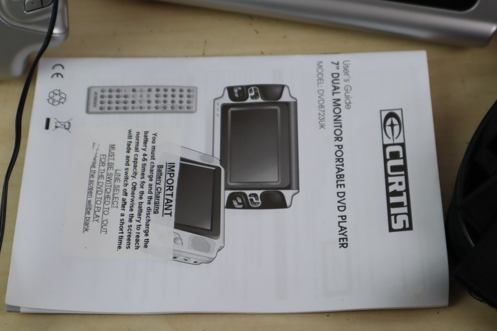 Curtis Portable DVD Player 7" Dual Screen 1 NOT WORKING + Case, Cables, Manual
