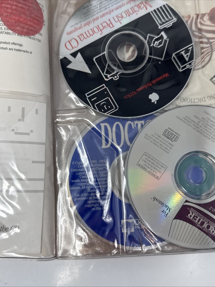 Vintage Macintosh 1990s CD-ROM Compact Discs Folder with 7 Discs