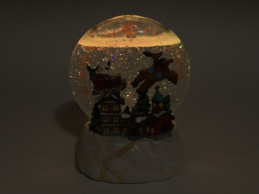 Led light up santa and sleigh snow globe