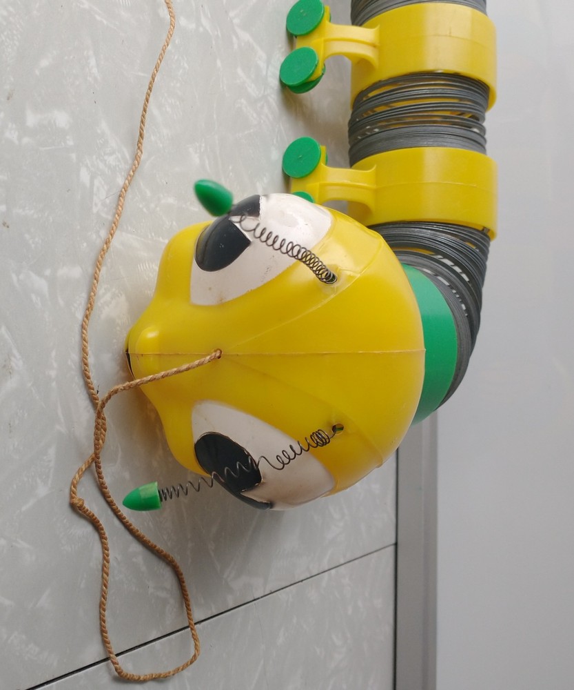 Vintage Slinky Cater-Puller Pull Toy Yellow Head Stretched Incomplete