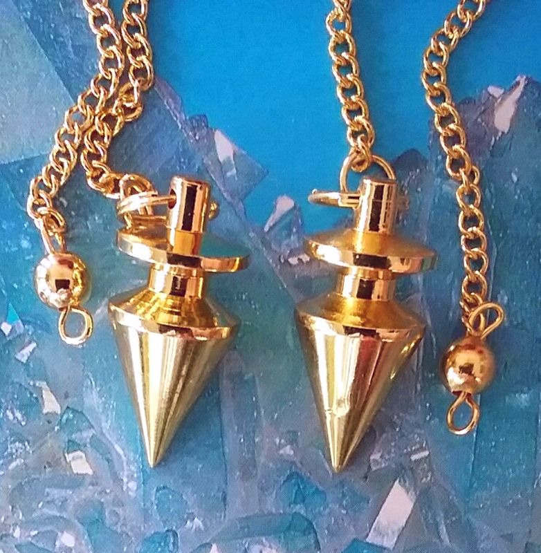 A SET OF 2 GOLD PLATED SOLID DOWSING PENDULUM POINTS WITH CHAINS AND 2 POUCHES