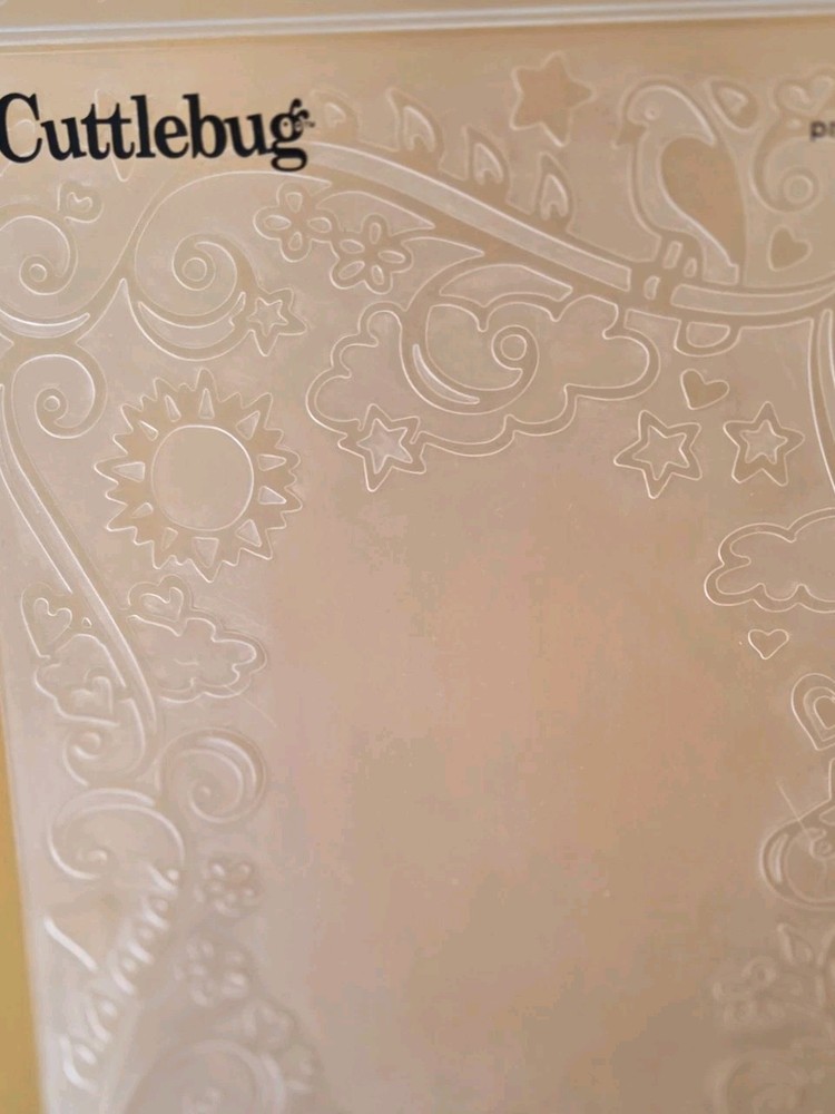 Cuttlebug Large 5 X 7 Embossing Folder- Sun, Stars, Clouds, Hearts
