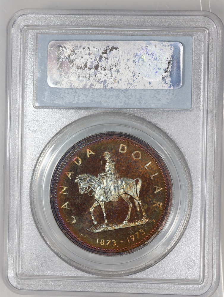 1973 Silver Canada R.C.M.P Dollar PCGS SP68 - Toned