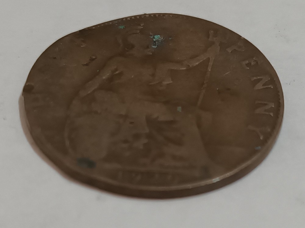 George V and George VI coins with error