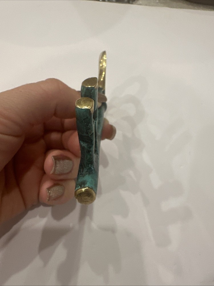 vintage brass key-shaped bottle opener and corkscrew.
