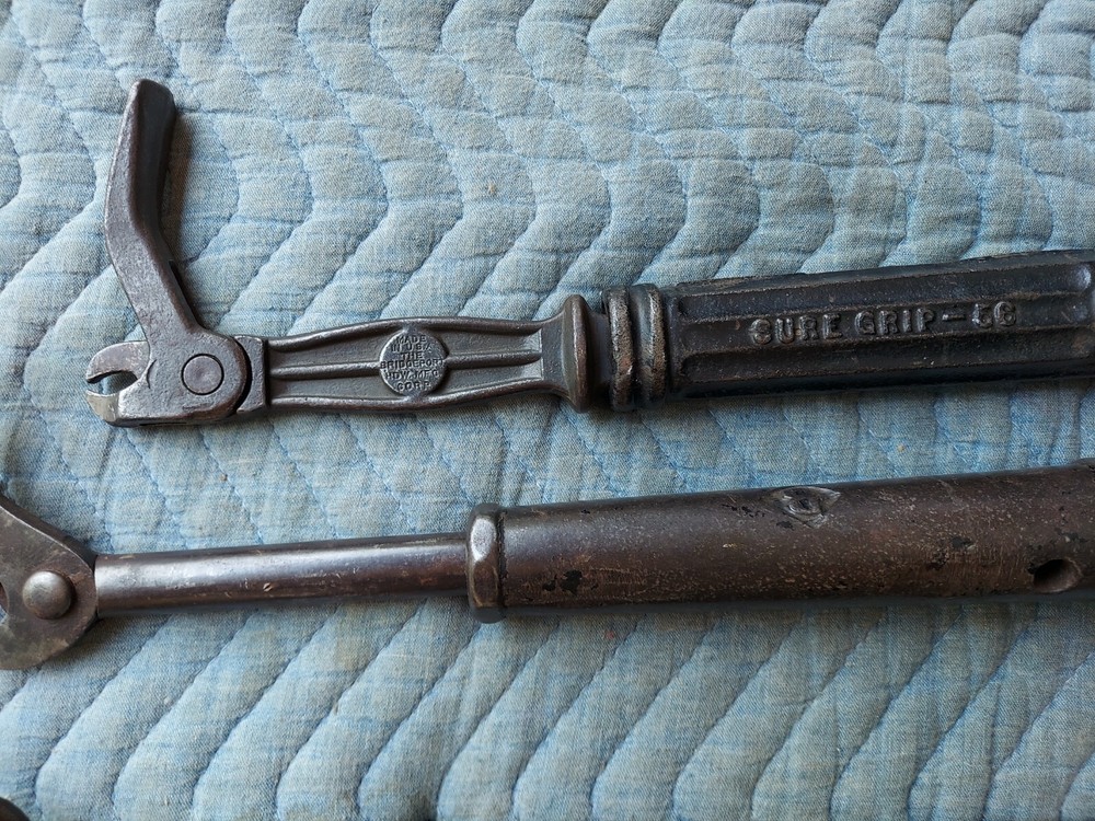 Collection of 8 different antique nail pullers
