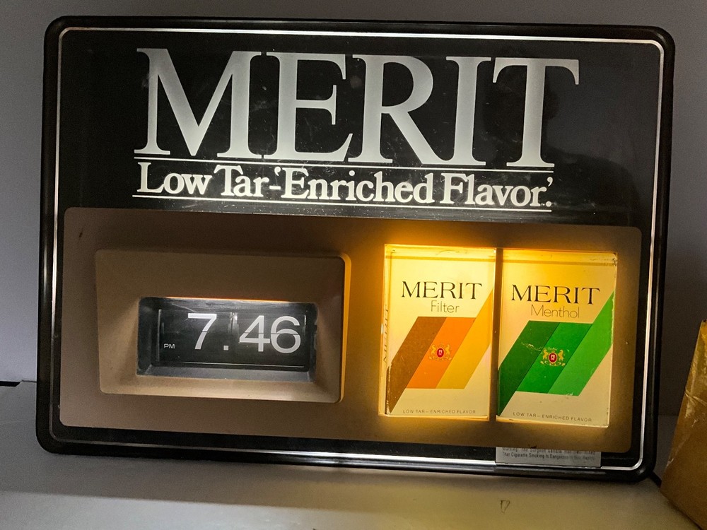 VINTAGE MERIT CIGARETTE LIGHT UP ADVERTISING CLOCK SIGN. WORKS