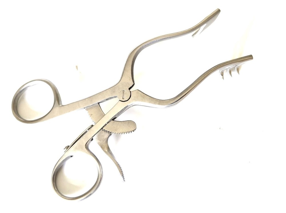 PERKINS Enduaral Retractor 5.25", left serrated solid blade, right side 3 teeth