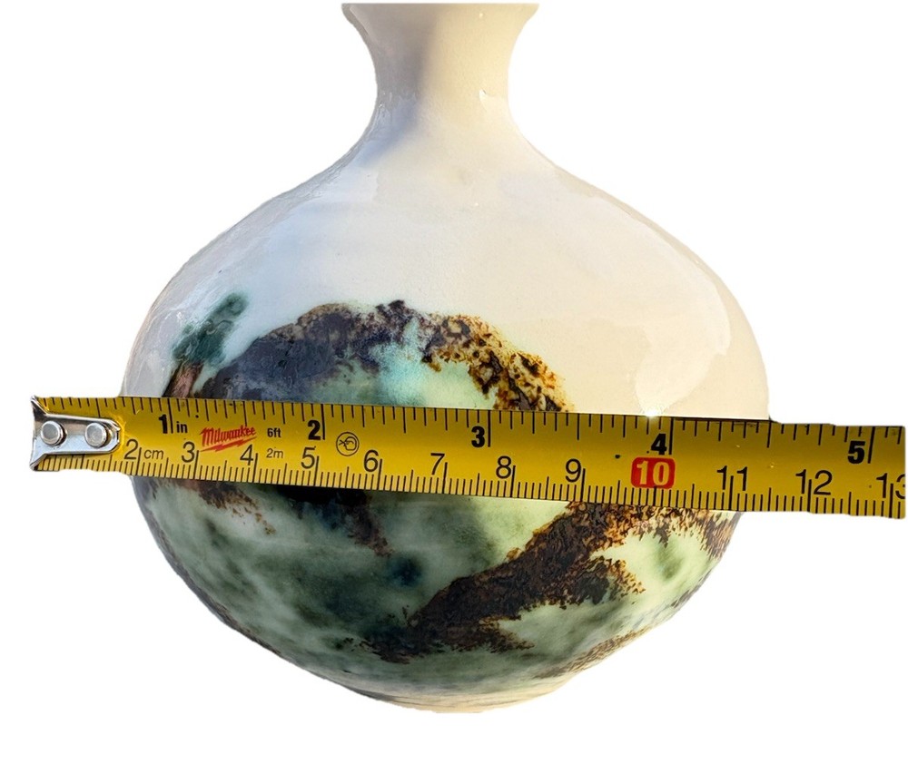 ceramic vase with an "Evergreen" design, featuring a water etching