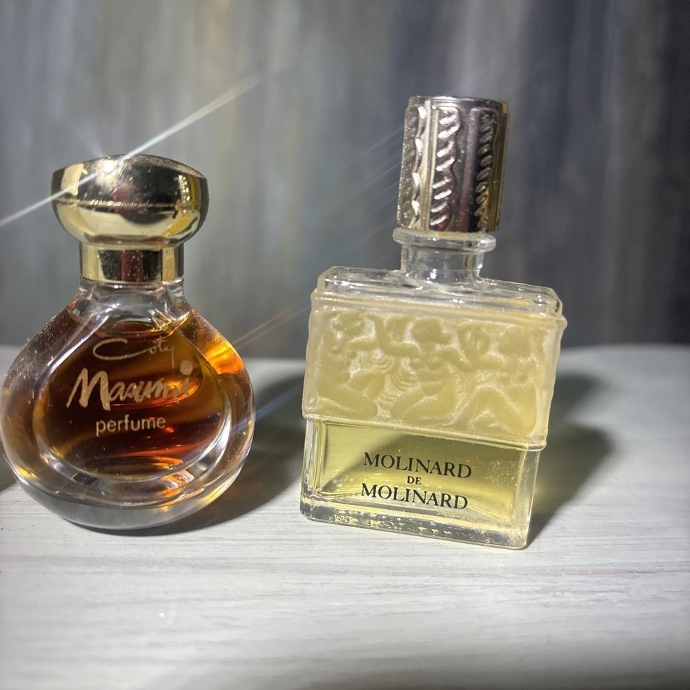 4 Vintage Mini perfume bottles. 3 Never Used, 1 Refil Case/ Bottle Empty.