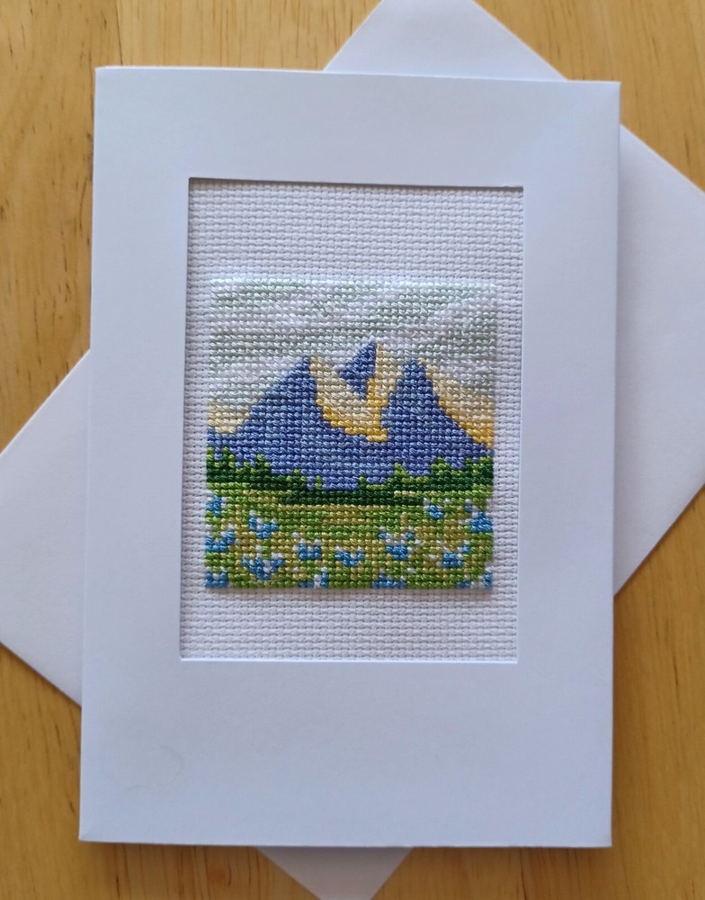 Mountains & flowers Finished X-stitch. White card, blank insert & envelope