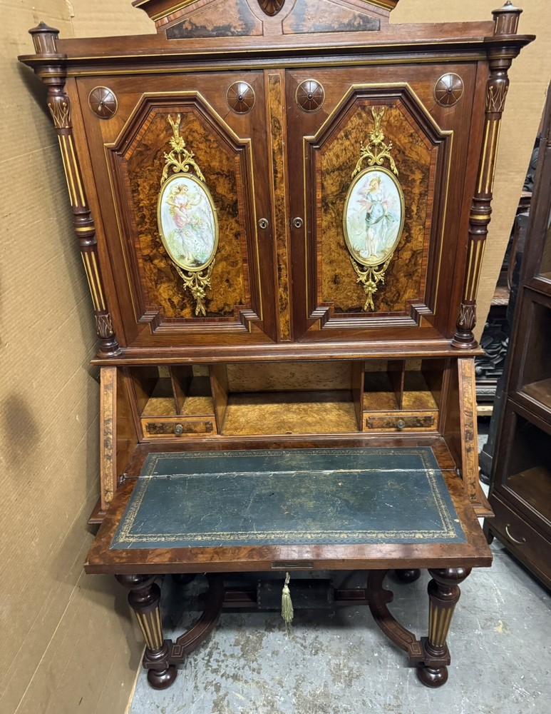 RENAISSANCE WALNUT AND BURLED DROP-FRONT DESK WITH PLAQUES