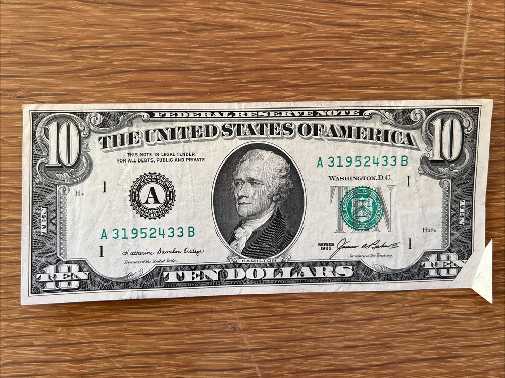 misprint and cut dollar bill