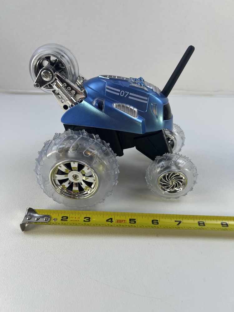 Thunder Tumbler Sharper Image Remote Control Spinning Car Blue